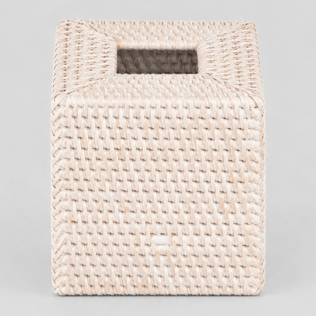 Woven rattan tissue box cover in Whitewash on a light gray studio background, in its Rectangular shape