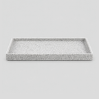 Speckled ceramic catchall tray in Speckled White on a light gray studio background.