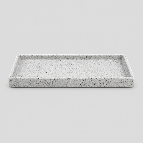 Speckled ceramic catchall tray in Speckled White on a light gray studio background.