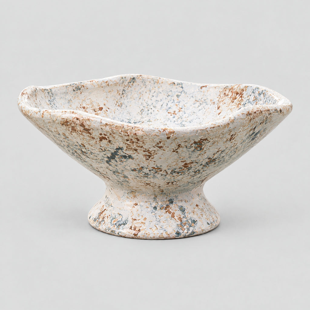 Ceramic footed planter bowl in Mottled White on a light gray studio background.