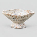 Ceramic footed planter bowl in Mottled White on a light gray studio background.