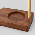 Close up of the carved tealight recess in the solid walnut base of the adjustable incense burner