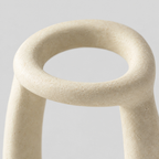 Close up of the matte stoneware surface texture of the Off-White sculptural ceramic candle holder.