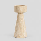 Travertine stone candle holder in Beige Travertine on a light gray studio background