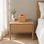 Woven rattan tissue box cover on a 48 cm wide oak bedside table in a calm room