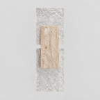 Yellow travertine block wall sconce in Yellow Travertine on a light gray studio background.