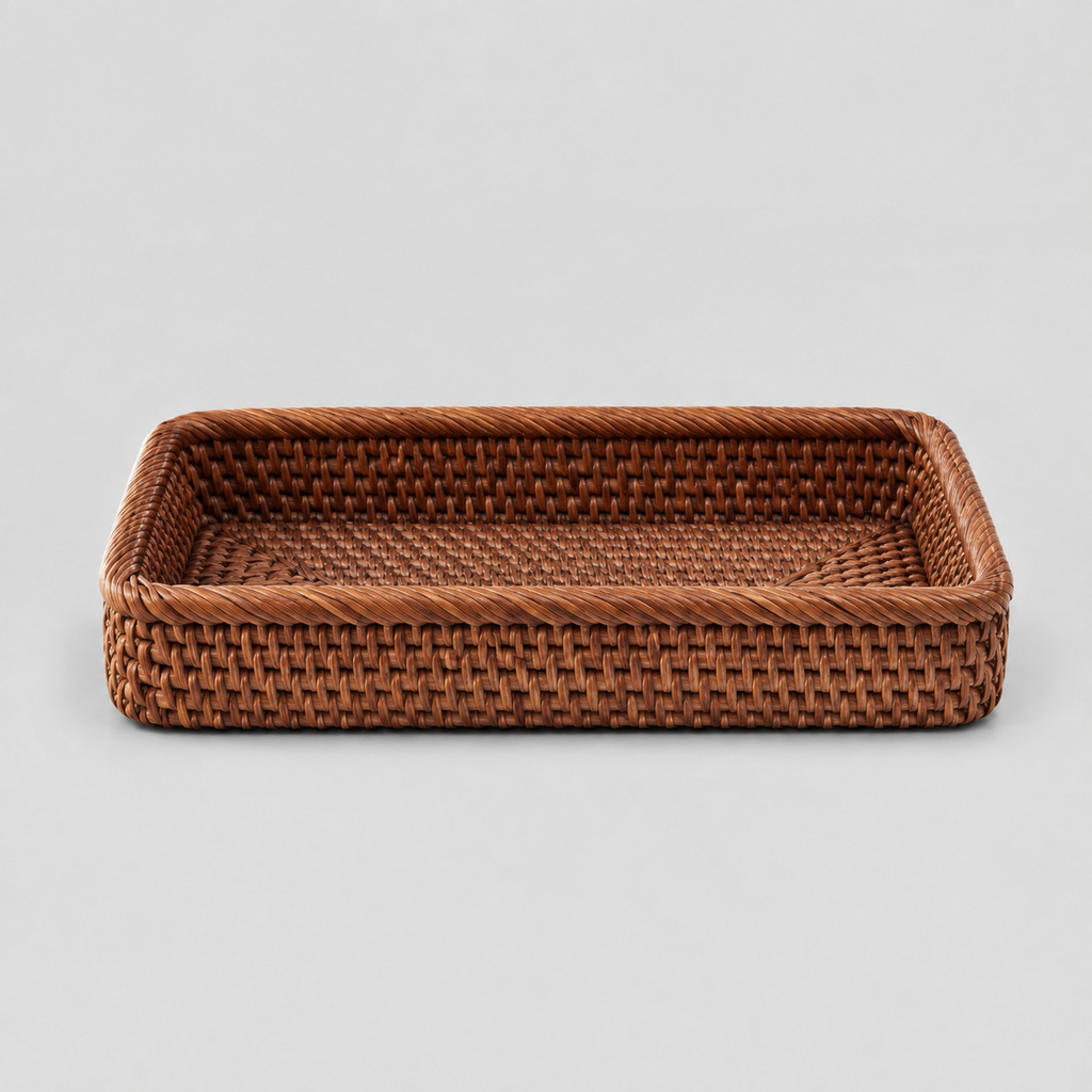 Brown rattan handwoven rectangular tray on a light gray studio background.