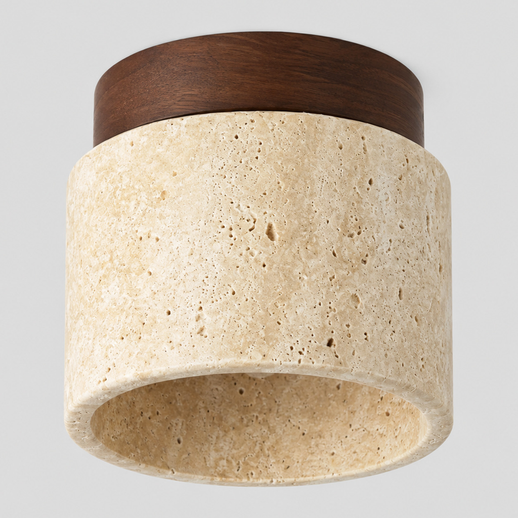 Cylindrical travertine flush mount ceiling light in walnut finish on a light gray studio background.