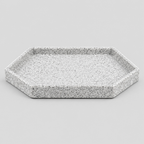 Speckled ceramic catchall tray in Speckled White on a light gray studio background, in its Hexagon shape