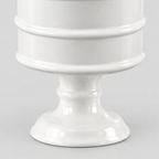Close up of the curved pedestal foot of the Glossy White ceramic pedestal candle vessel.
