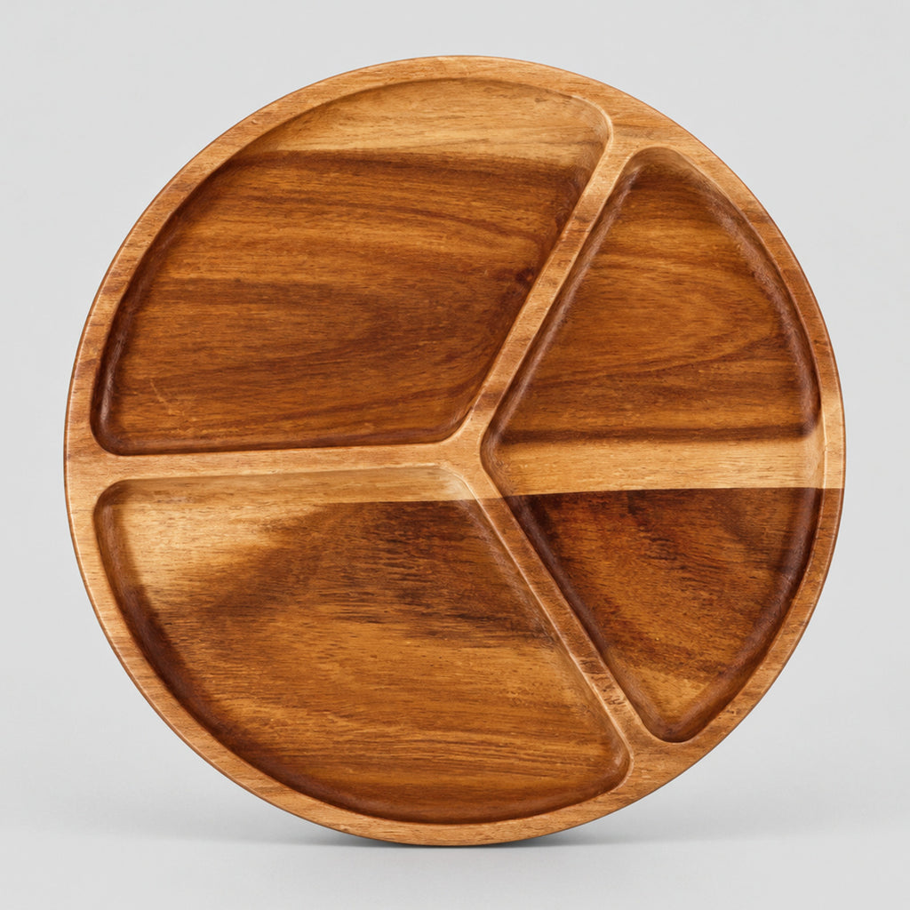 Three-compartment round wooden serving tray in Acacia Wood on a light gray studio background