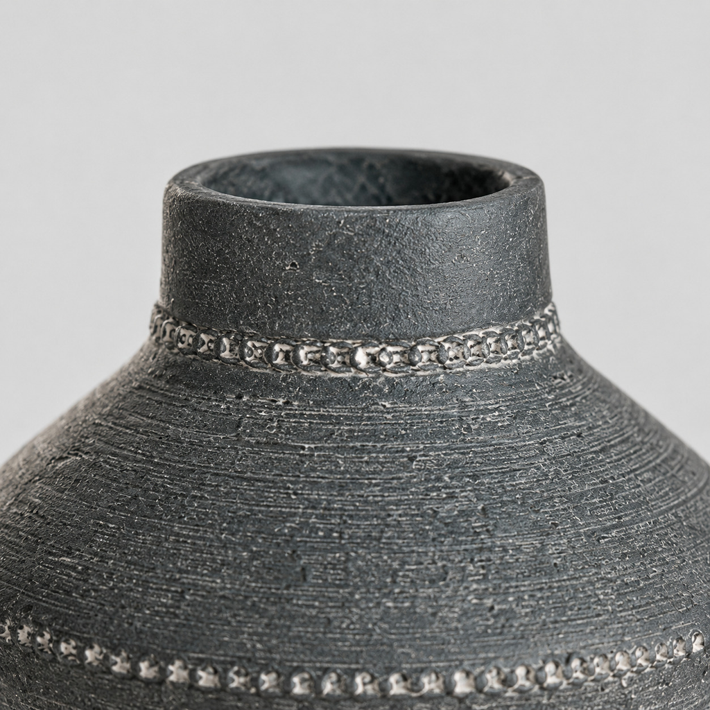 Close up of the smooth cylindrical rim or lip of the Antique Gray textured ceramic urn vase.
