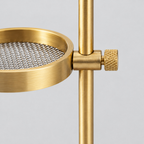 Close up of the knurled thumbscrew on the brass fitting of the adjustable incense burner