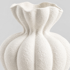 Close up of the textured matte glaze of the fluted ceramic vase in Matte White.