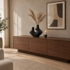 Dual-neck abstract ceramic vase on a walnut sideboard styled with dried pampas grass