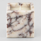 Calacatta Viola square marble candle holder on a light gray studio background.