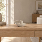 Speckled Off-White ceramic taper candle holder on a 120 cm wide oak console table in a calm room