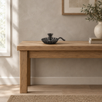 Cast iron chamberstick candle holder on a 120 cm wide oak console table in a calm room