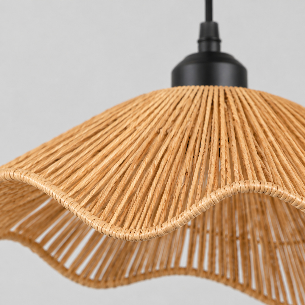Close up of the weave or fabric texture of the shade of the wavy woven rattan pendant light