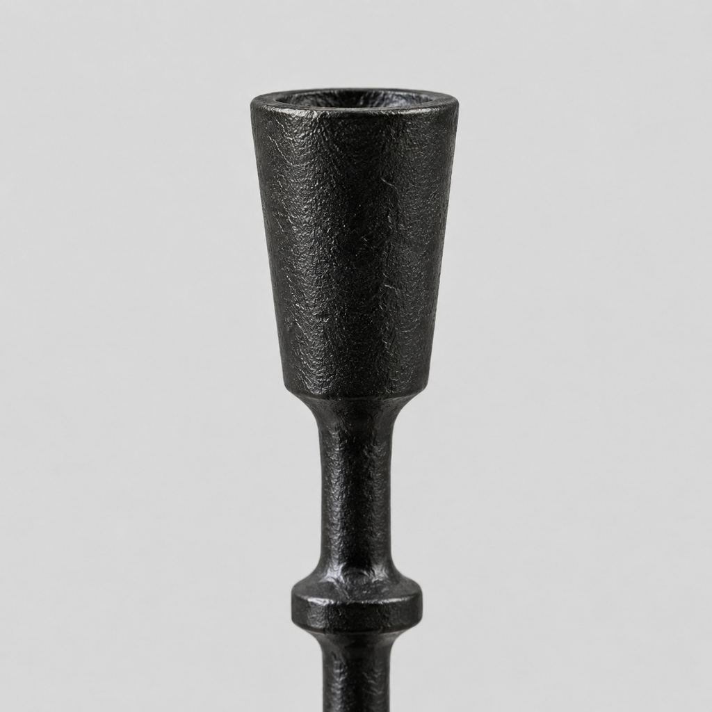 Close up of the rim of the candle cup of the Matte Black cast-iron taper candle holder