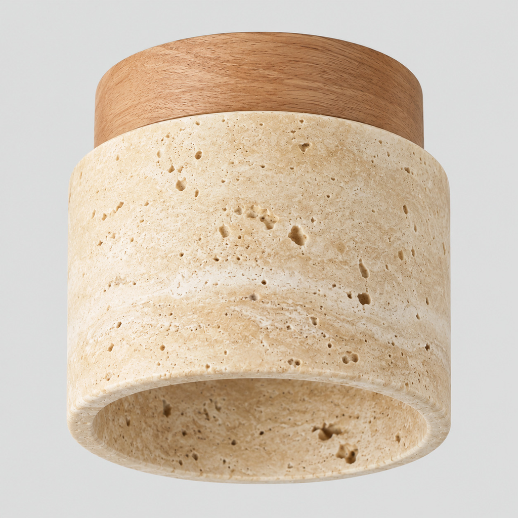 Cylindrical travertine flush mount ceiling light in natural wood finish on a light gray studio background.