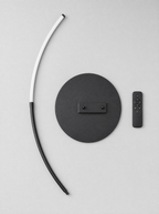 What is in the box for the LED arc floor lamp, arm sections, weighted base and remote control