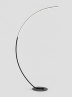 Black LED arc floor lamp with a flat curved light arm on a light gray studio background