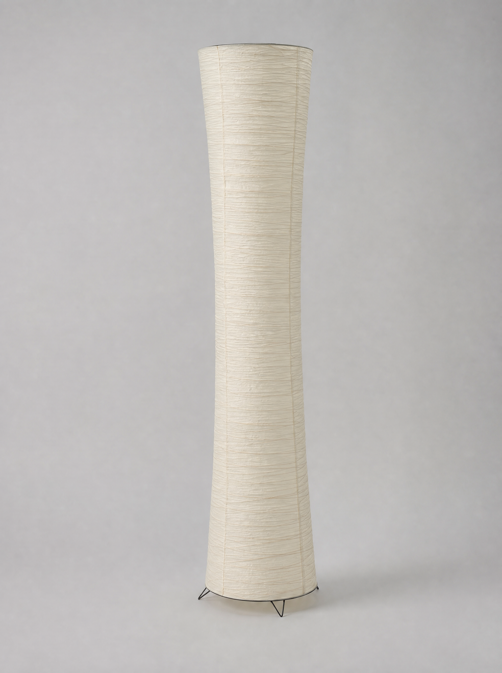 Cream rice paper column LED floor lamp on a light gray studio background