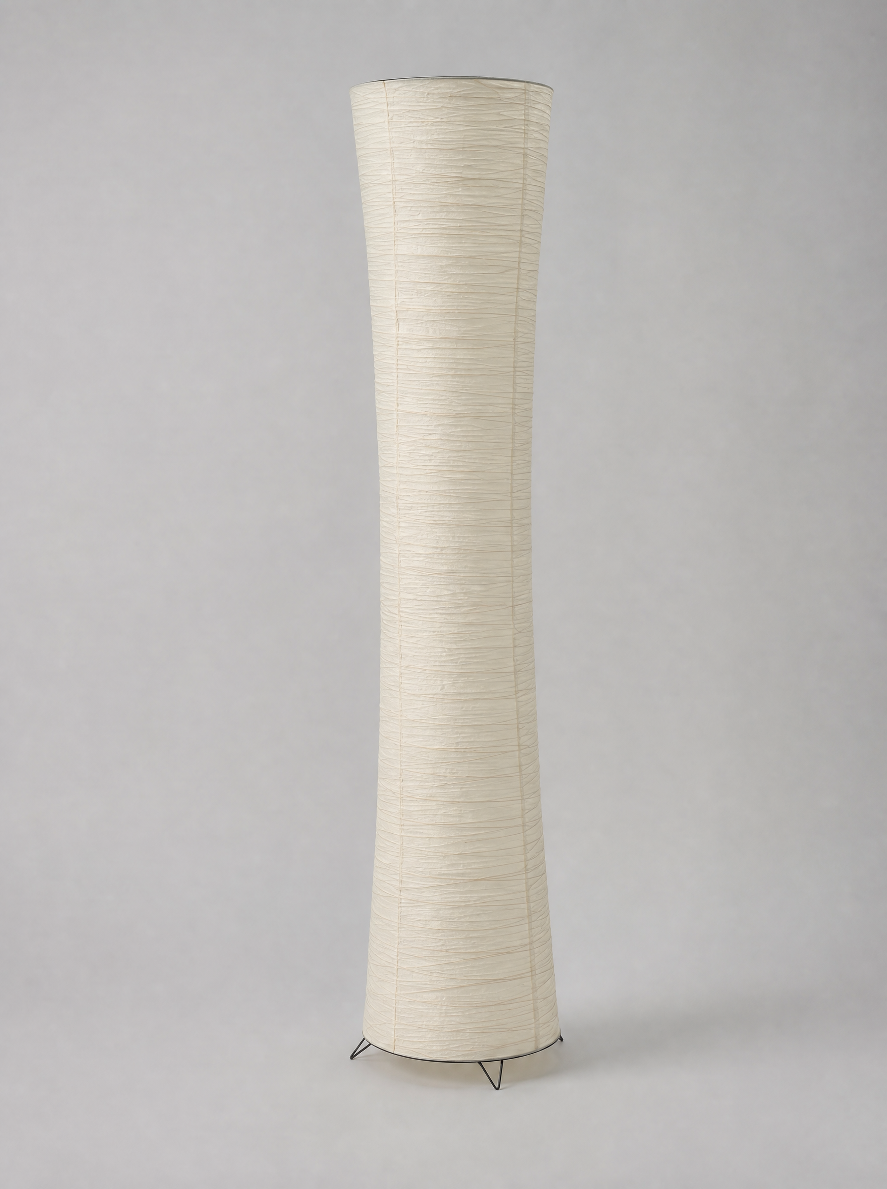 Cream rice paper column LED floor lamp on a light gray studio background