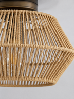 Close up of the woven rope texture on the rattan drum ceiling light