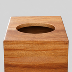 Close up of the smooth oval cutout rim of the square wooden tissue box cover in Acacia Wood