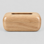 Curved solid wood tissue box cover in Natural on a light neutral gray studio background.