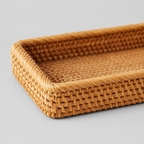 Close up of the thick braided rim on the natural rattan tray.