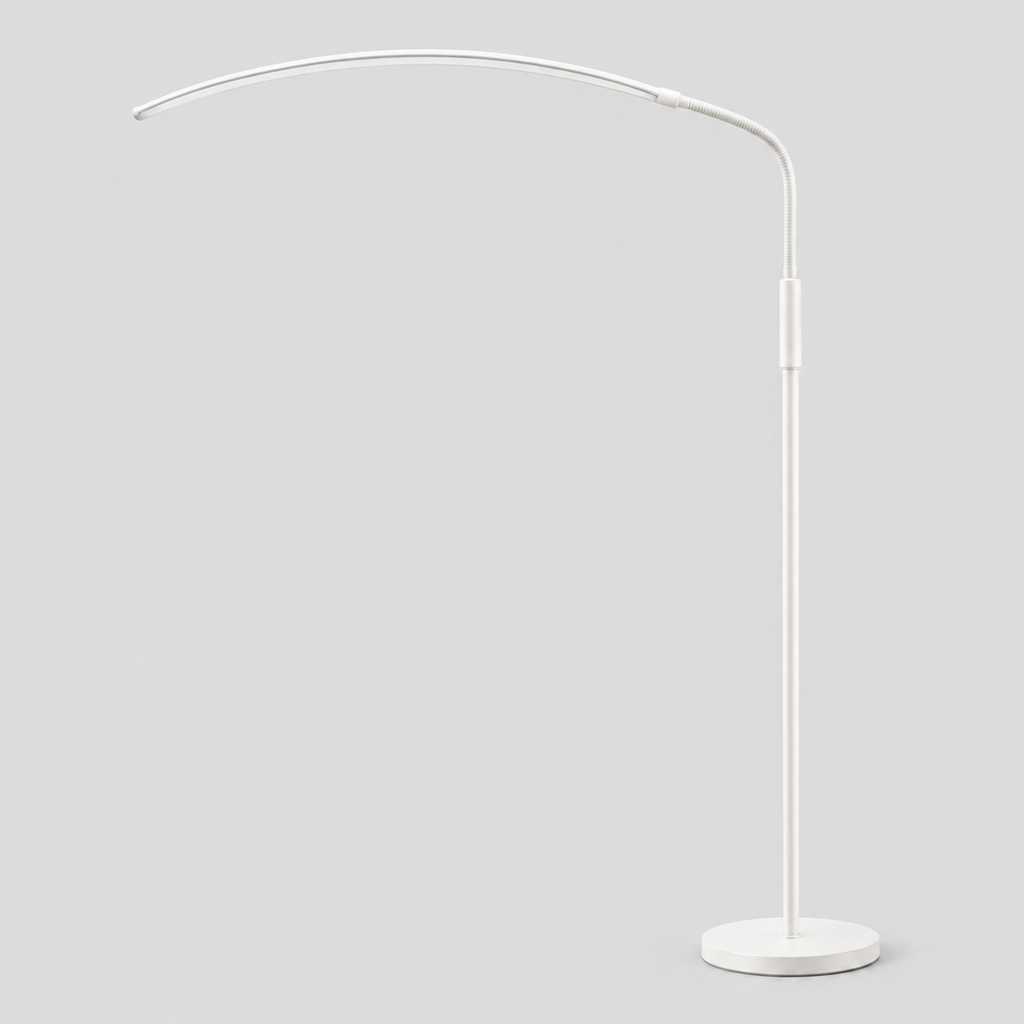 Matte White arched LED floor lamp on a light gray studio background, in its Crescent shape