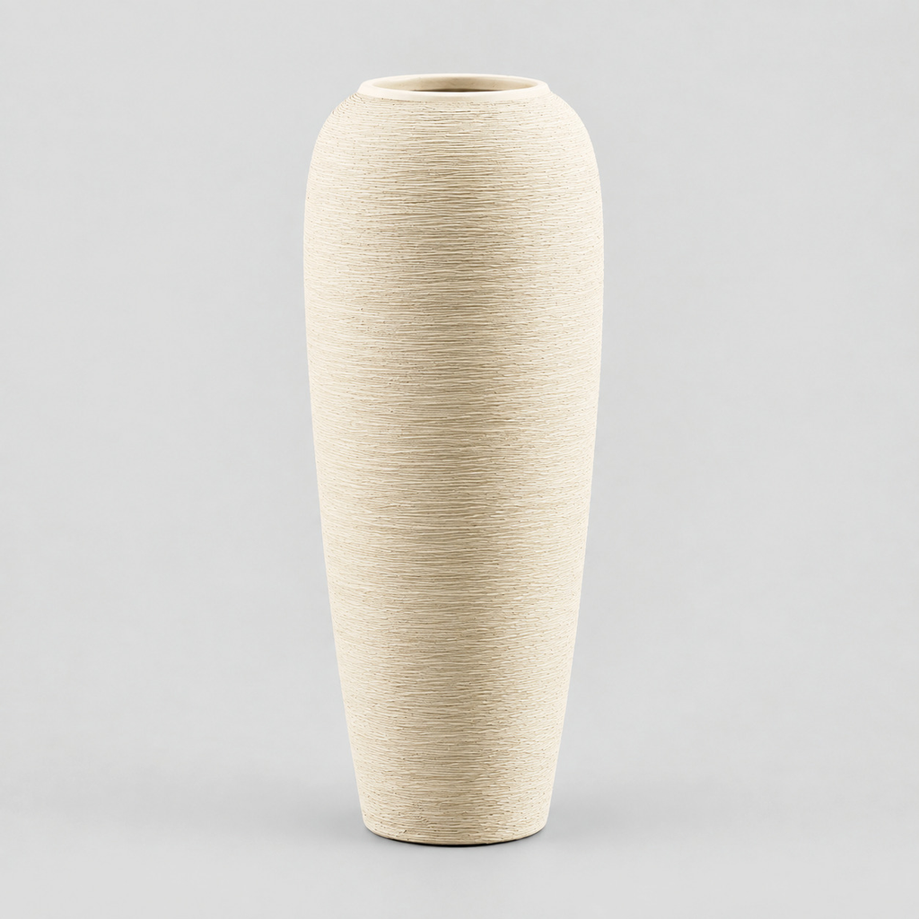 Tall ribbed stoneware vase in off-white on a light gray studio background.