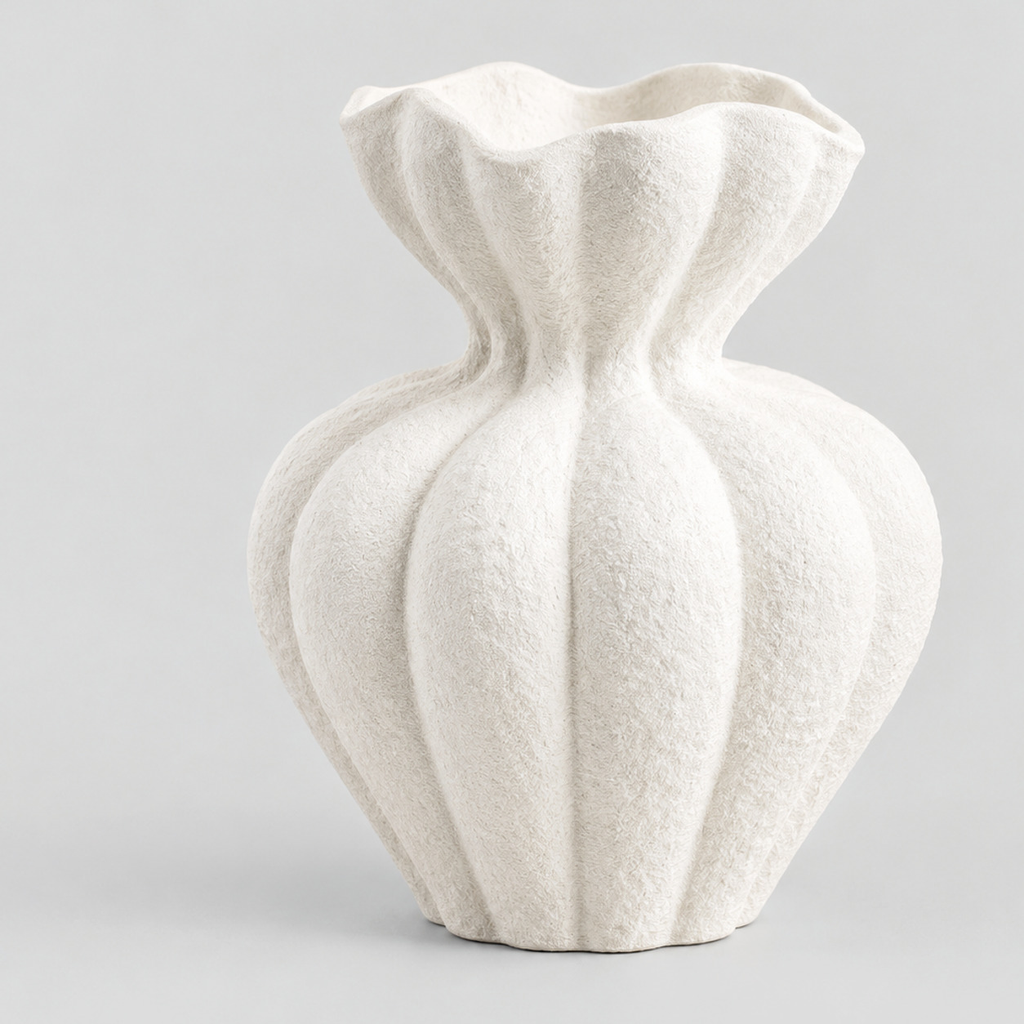 Fluted ruffled ceramic vase in Matte White on a light gray studio background.