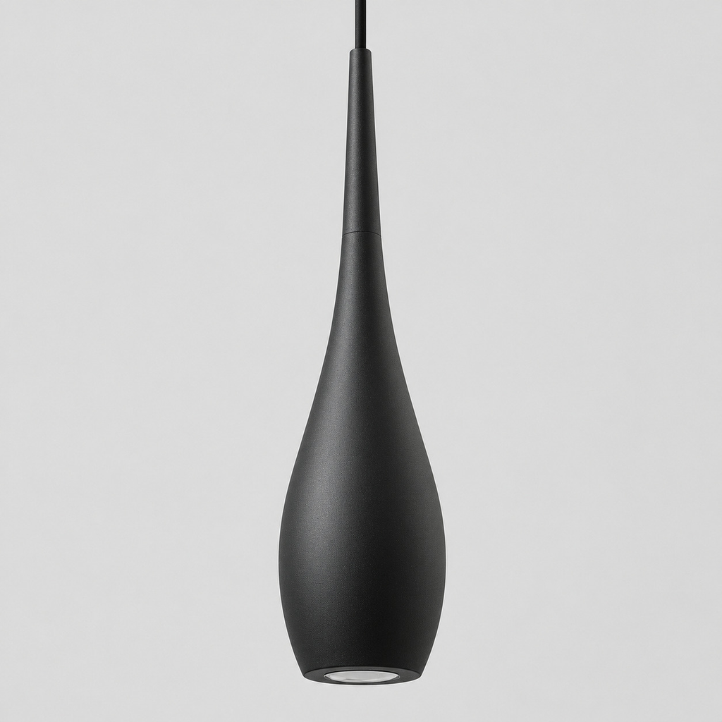 Close up of the finish at a seam of the metal body of the Matte Black slender teardrop pendant light.