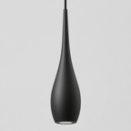 Close up of the finish at a seam of the metal body of the Matte Black slender teardrop pendant light.