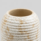 Close up of the smooth unglazed rim of the ribbed barrel ceramic vase in Distressed White.