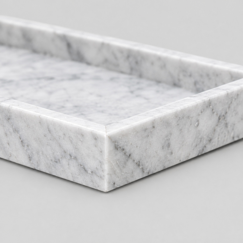 Close up of the mitered corner seam of the Cloud White rectangular marble vanity tray.