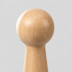 Close up of the turned rounded knob of the turned beech wood wall peg.