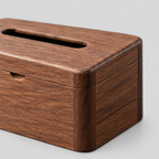 Close up of the flush corner joint of the solid walnut hinged tissue box.